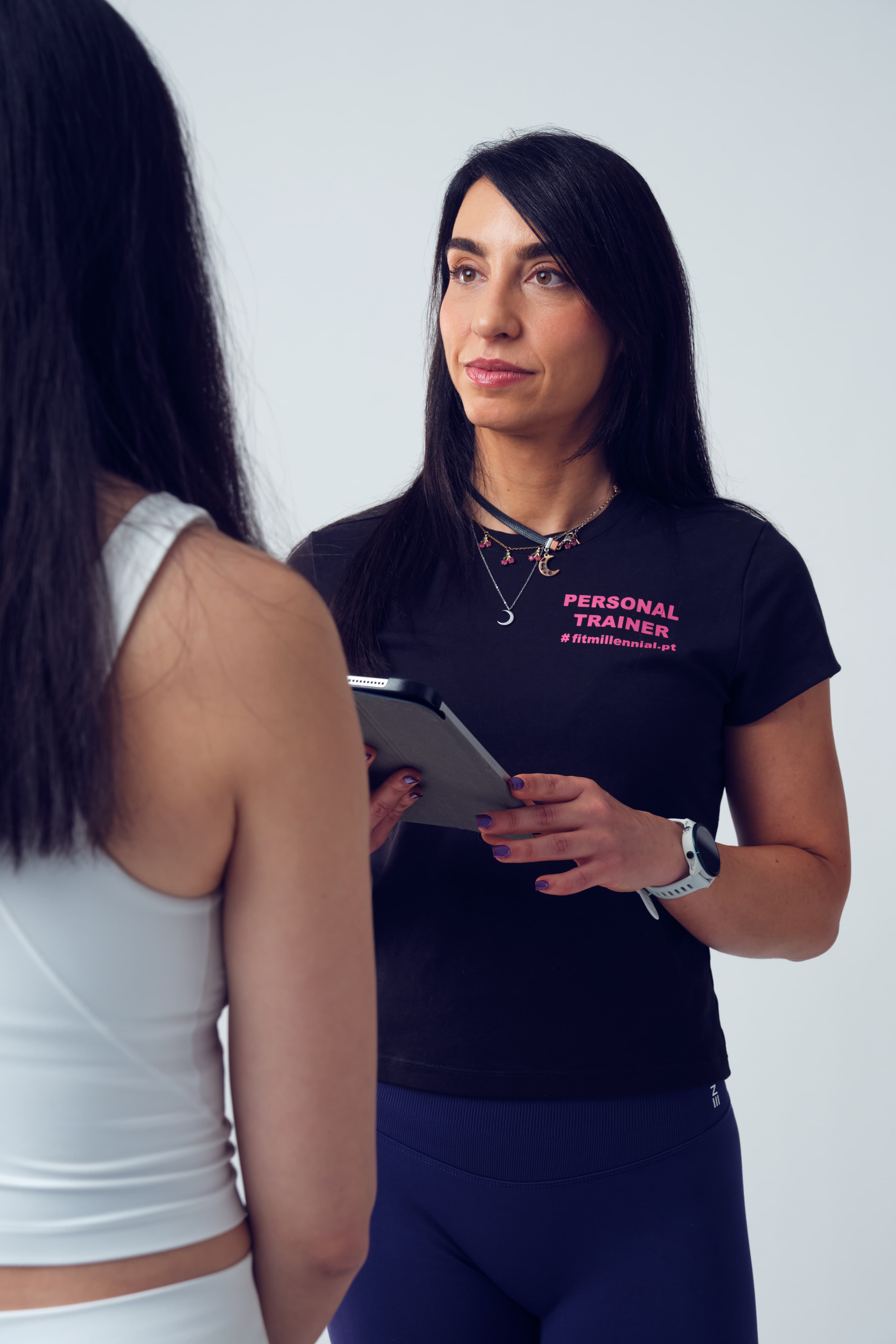 Roberta demonstrating a side view dumbbell lunge